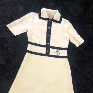 Worn once at a Polo match.